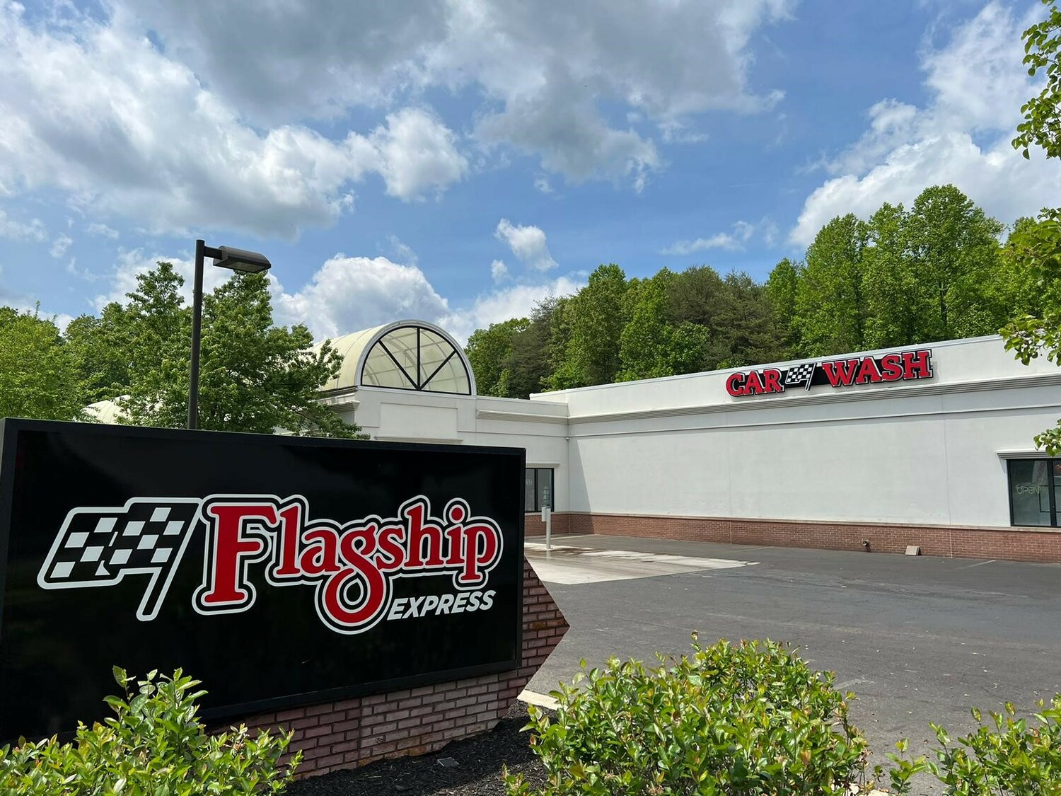 Flagship Carwash exterior sign at new Express location on Hoadly Road in Manassas, Virginia.