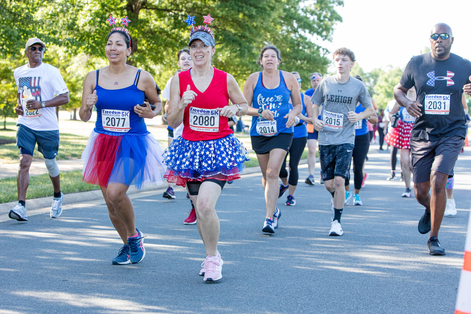Runner celebrate the day wearing festive 4th of July costumes and accessories.