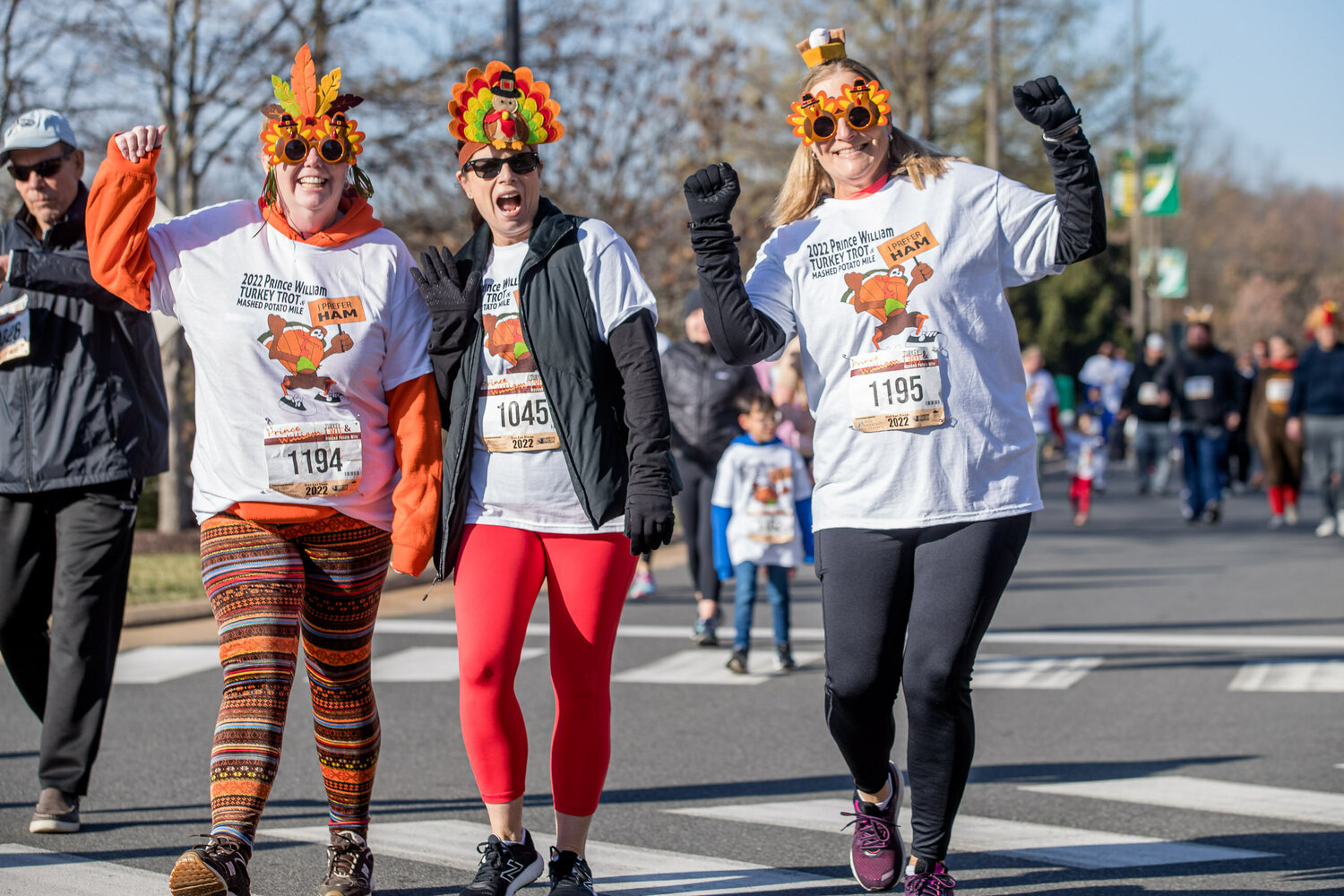 Friends coordinate dress to run together at the Prince William Turkey Trot.