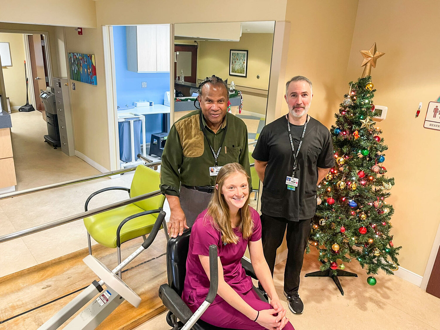 Alanzo, Eric, and Danielle celebrate a successful season of patient rehabilitation.