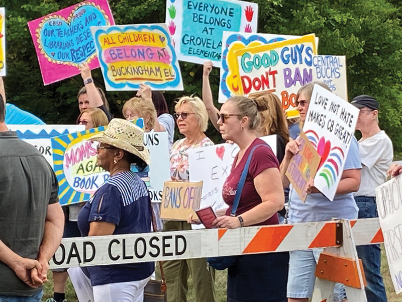 About 100 people gathered before the Central Bucks School District meeting Tuesday to protest a library policy they said is not a policy but is censorship.