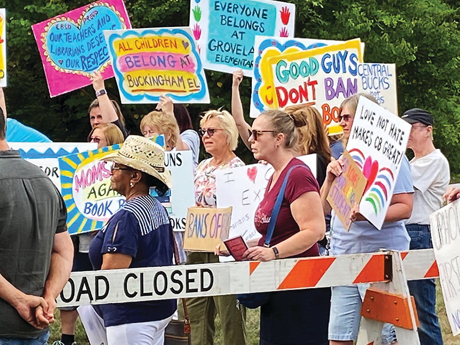 People gather before a Central Bucks School District meeting to protest a library policy they describe as nothing less than a book ban. The policy, which would put the power to remove books from the school library shelves in the hands of “superintendent’s appointees” was approved in a 6-3 vote.