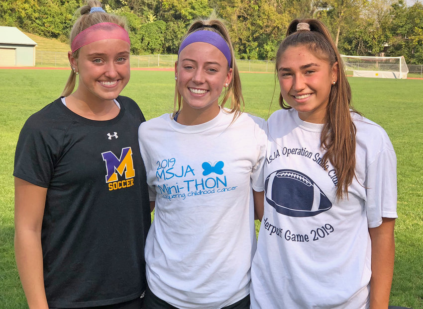 Pictured just after their pre-practice temperature check are the Mount's senior soccer captains (from left) Emily Friel, Cayla Higginson and Ava Picofazzi.  (Photo by Tom Utescher)