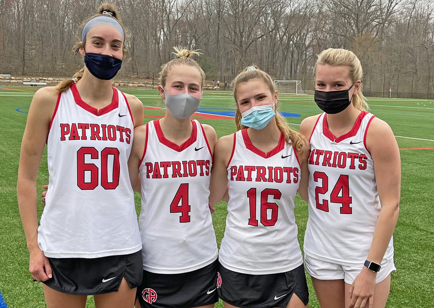 GA's five seniors are all lacrosse team captains this spring; (left to right) Elise Smigiel, Talison Jordan, Devin Smith and Juleanna Landmesser. Mackenzie Smith is missing from photo.  (Photo by Tom Utescher)