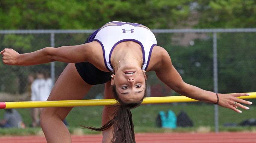 Mount St. Joseph junior Liz Sadorf clears the bar in the high jump competition.&nbsp; Photo by Tom Utescher