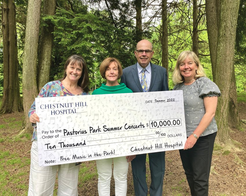 Chestnut Hill Hospital is once again supporting the Chestnut Hill Community Association's popular outdoor concert series in Pastorius Park, this year writing a $10,000 check to be the presenting sponsor. Pictured here are Anne McNiff, CHCA Executive Director, Kathi Clayton, CHCA Board President, and Chestnut Hill Hospital leadership Dr. John Scanlon and Cathy Brzozowski. Concerts begin on Wed. June 15 and run through Wed. July 27.
