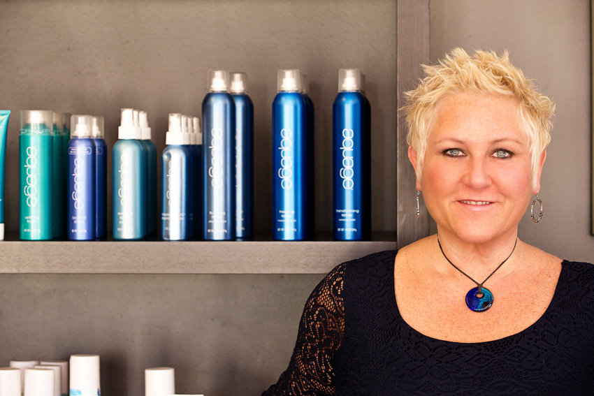Wendy Weinstein, owner of Ground Zero hair salon, says the pandemic has helped turn gray hair into a trendy alternative.