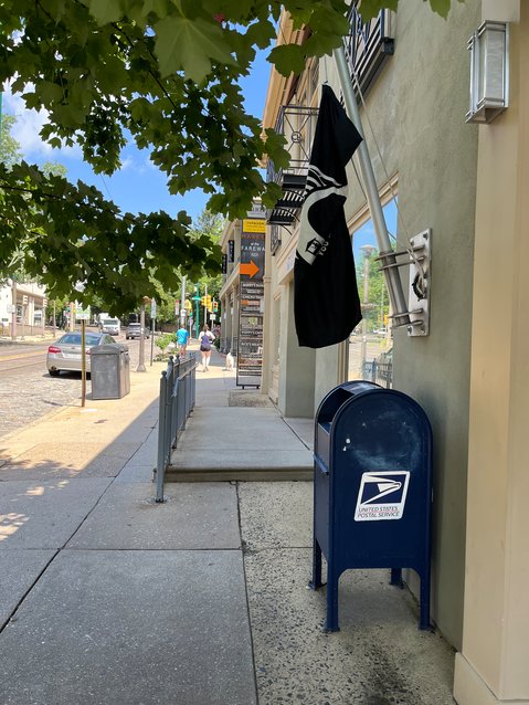A number of Chestnut Hill residents have had issues with checks being stolen and washed after mailing them in outdoor mailboxes around the neighborhood, including this one outside the Chestnut Hill Post Office on Germantown Avenue. Some residents claim they&rsquo;ve had checks washed and stolen even when they were mailed inside the post office.