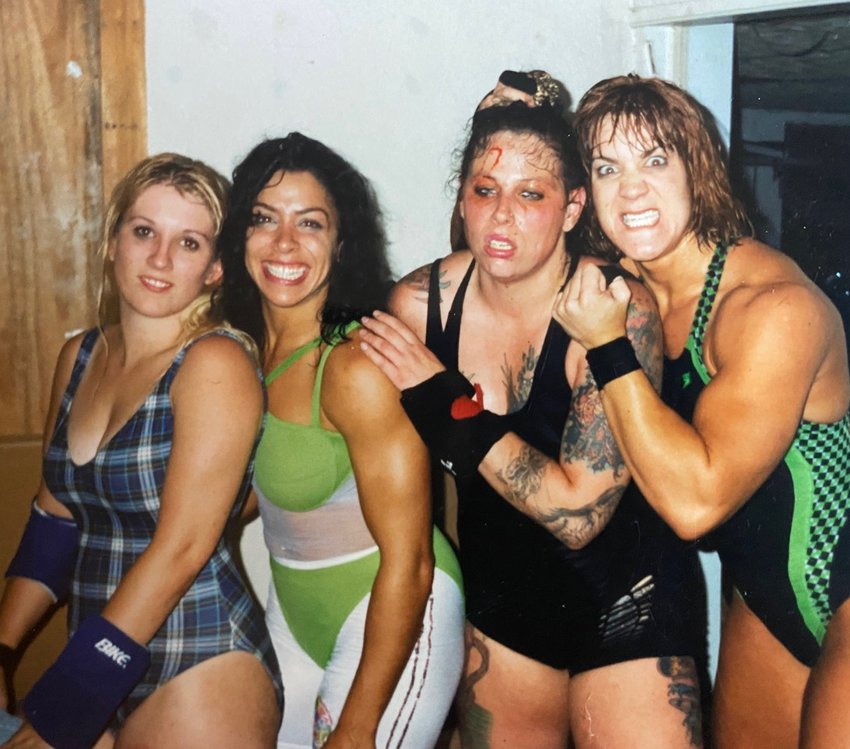 Heather Gray (far left), whose wrestling moniker was Heather McMasters, is seen with some of her wrestling buddies &mdash; Riptide, Psycho Sybil and Joanie (Chyna).