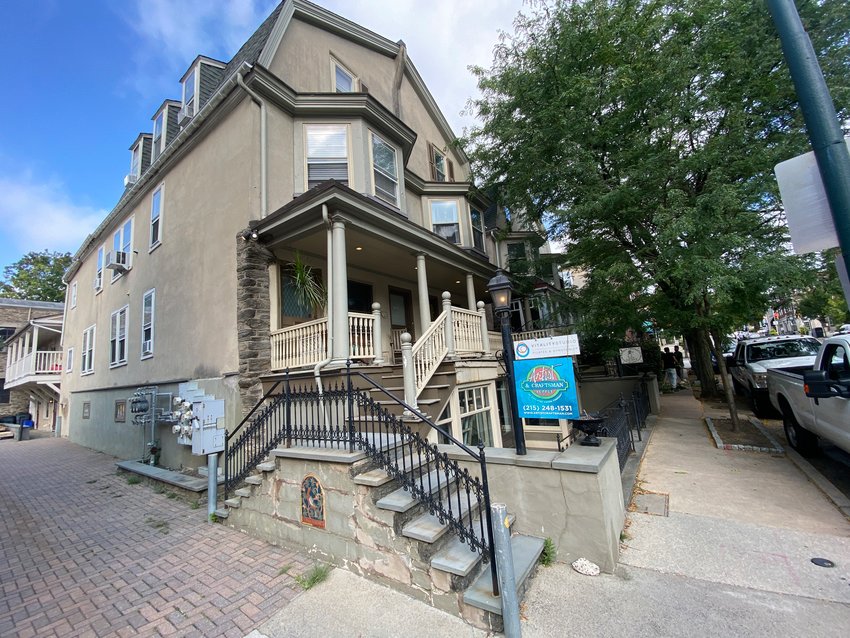 This porch-front building at 7928 Germantown Avenue, owned by Bowman Properties, is one of a number of buildings for which the company wants to convert some retail space over to residential use.