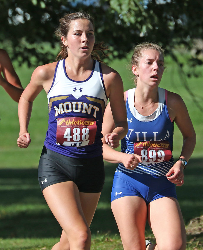 Seen contending with a league rival from Villa Joseph Marie, Mount St. Joseph senior Maggie Murphy would finish third among area runners and 45th overall last Saturday.