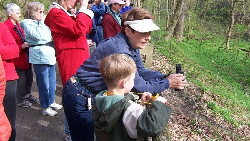 Longtime bird and nature walk guide Ruth Pfeffer (in white visor and with binoculars) will be honored.