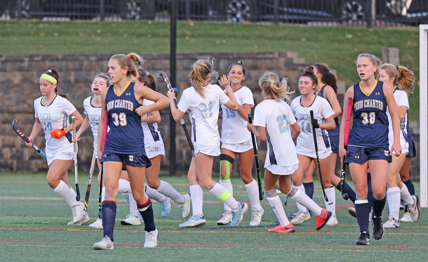 After she scored the final goal in last Tuesday's game, SCH sophomore Kira Vakil (center, number 15) was congratulated by her teammates.