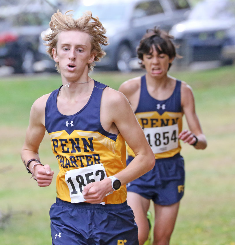 Penn Charter number one Wesley Trautwein runs just ahead of sophomore teammate T.J. Zwall near the end of the Inter-Ac race. They would place sixth and seventh, respectively.