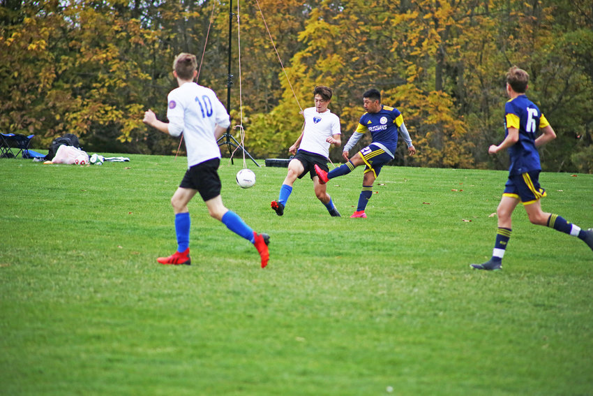The U19 boys, CHYSC travel soccer's oldest boys team, battled King of Prussia on Saturday and came out with a 2-0 win. Above, Calder Cook moves to take away the ball from a King of Prussia player.