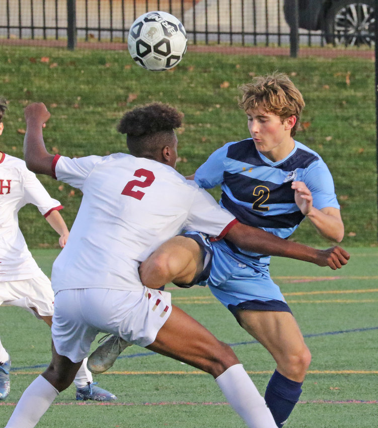 While the soccer ball hovers nearby, SCH senior Colin Woehlcke and Haverford's Papi Harris appear to engage in some form of mixed martial arts match.