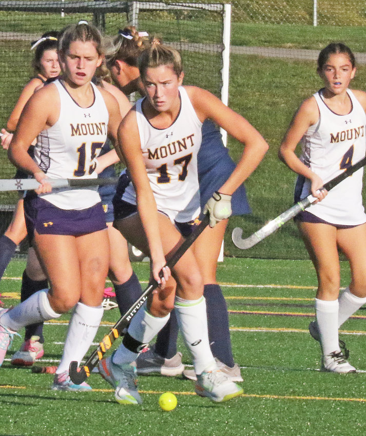Mount senior and Norwood Fontbonne Academy grad Devin Loome brings the ball up the field against Merion.