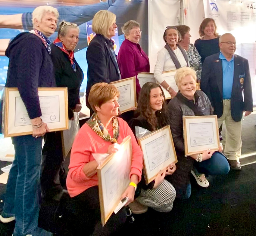 Rowers from the Vichy Eight and their coach (right) at their recent Hall of Fame induction. Barbara Hoe is in the back row, third from right.