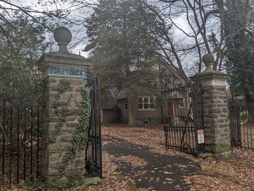 The original Greylock gatehouse at 8835 Crefeld St. is sandwiched between Crefeld School and the Wissahickon.