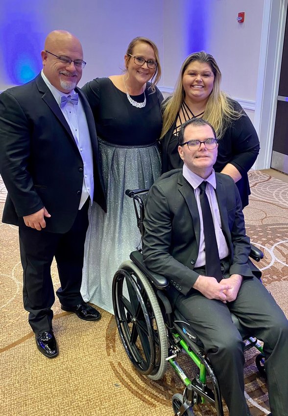 (From left) Kevin Jaroma, award-winning nurse Charlotte Jaroma, and Lisa and Chris Minetti, who nominated Jeroma for the honor.