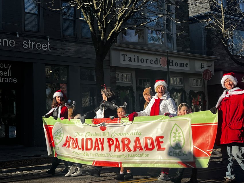 The Chestnut Hill Community Holiday Parade featured more than 300 participants, including floats, bands, choirs, and of course, Santa Claus.