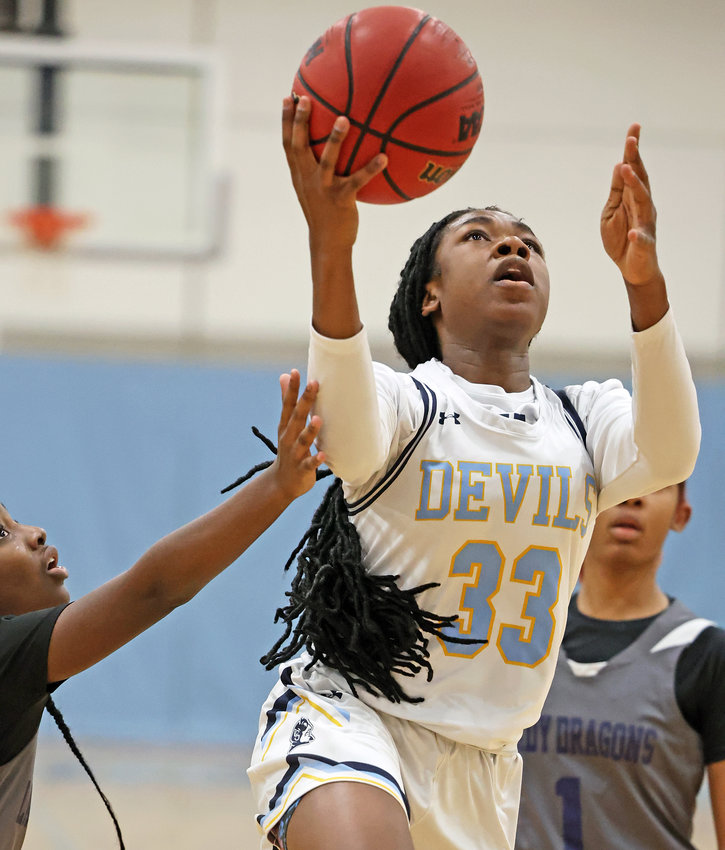 Zoe Thompson lifts off for a layup on her way to a game-high 15-point performance for the Blue Devils.