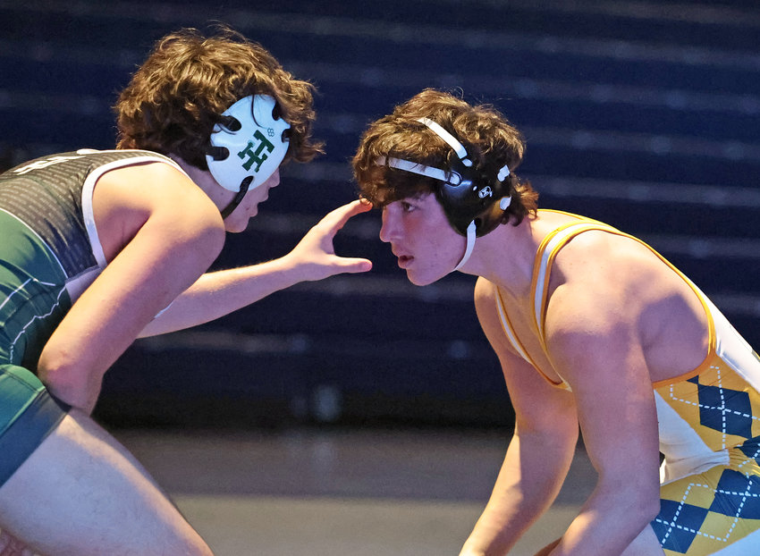 Penn Charter senior Pat Rullo (right) eyes up his Tower Hill opponent in the 165 lb. class.