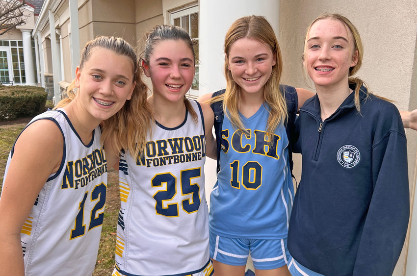 Four friends and club team teammates posed outside the Norwood gym after Thursday's game with Springside Chestnut Hill. From left to right are Neely Lesovitz and Shae Flaherty of Norwood, and Finley Paul and Mimi Gallagher of SCH.