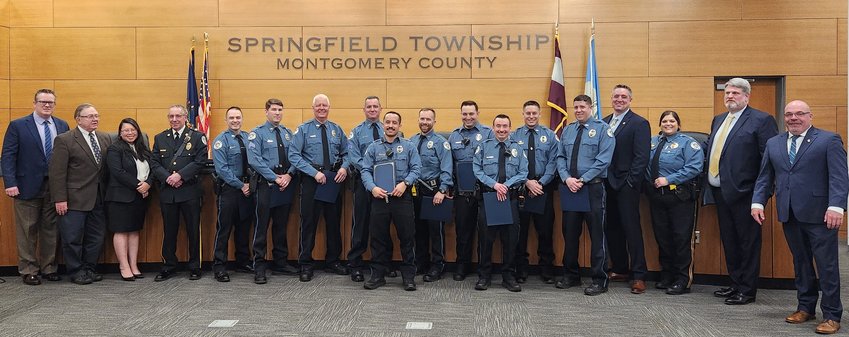 Springfield Township Police commendation honorees and commissioners at the March 8 board meeting