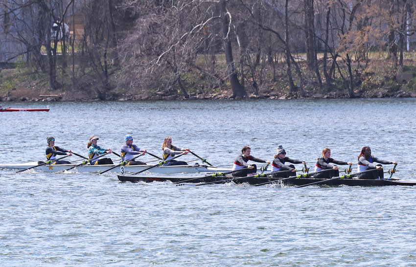 Penn Charter (left) leads Germantown Academy near the end of the girls' varsity quad race.  (Photo by Tom Utescher)