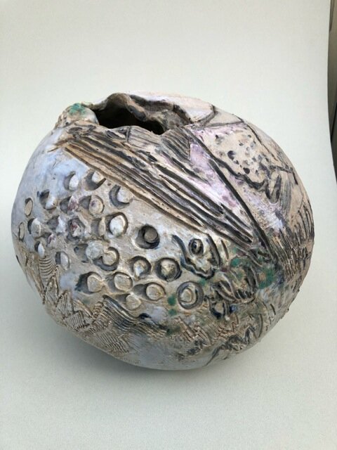 &ldquo;Orb,&quot; by Carole Sivin, was made from stoneware, oxides and glazes.