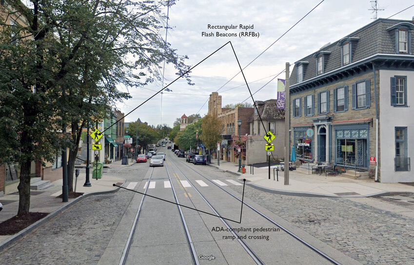 A rendering of the proposed changes to the intersection of Germantown Avenue and Durham Street, which shows the added crosswalk and the sidewalk bump-outs on either side.