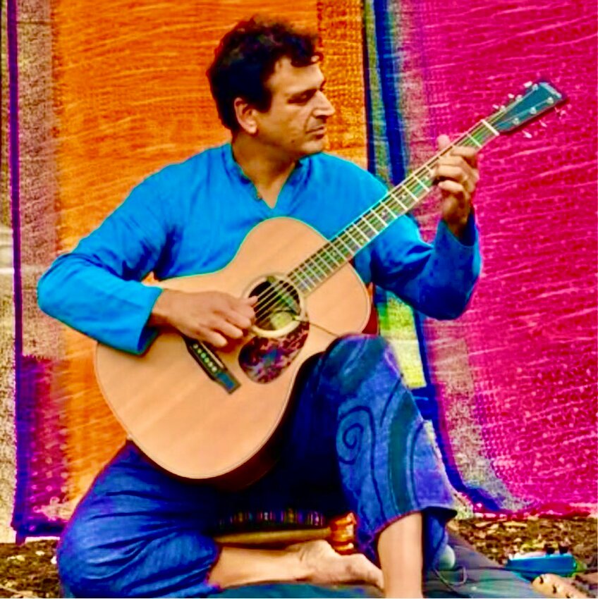 Mt. Airy teacher/musician Raji Malik will be performing original acoustic guitar pieces from his new album, &ldquo;Time of the Glowing,&rdquo; at the Mt. Airy Art Garage, 7054 Germantown Ave., on May 9, 6 p.m.