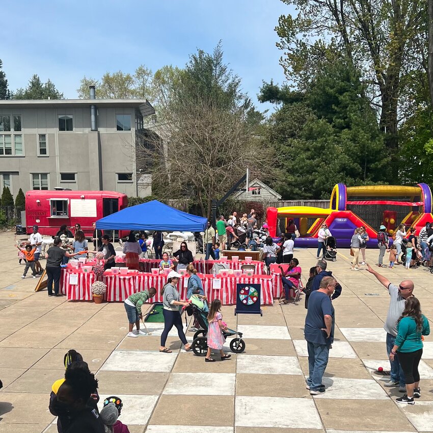 Families enjoy the fun last year at the Chestnut Hill Home &amp; Garden Festival's Kid's Zone, hosted by the Jenks Academy for the Arts and Sciences.