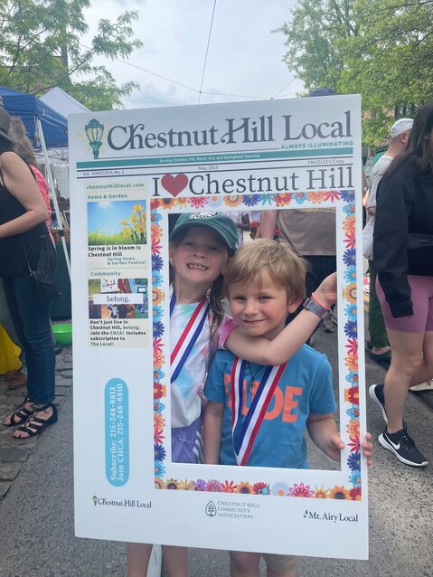 Chloe and Kai Jacquette were among many who stopped for a portrait at the festival on Sunday.