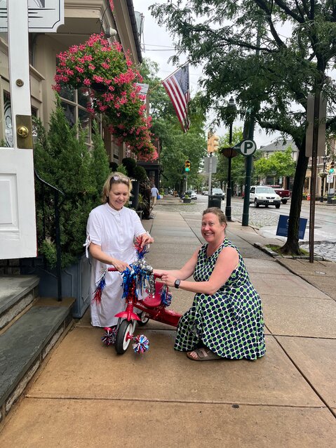 Threadwell owner Molly Ellis and Courtney O'Neill, executive director of the Chestnut Hill Business District, are among many in the local community who are working to get ready for the neighborhood's Fourth of July celebrations, which will be featured this year on &quot;Good Morning America.&quot;