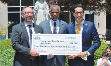 Rep. Tarik Khan (right) and State Sen. Art Haywood (center) joined Norwood-Fontbonne Academy president, Dr. Ryan Killeen (left), at an award presentation ceremony May 30.