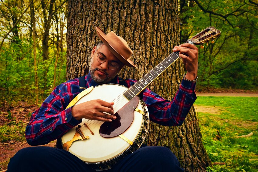 Musician Dom Flemons, a former member of the acclaimed Carolina Chocolate Drops, will perform in a free concert at Pastorius Park on July 12 at 7:30 p.m.