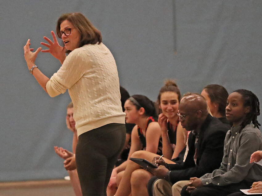 Seen instructing her players during a home game, Sherri Retif has retired from the position of head girls' basketball coach at Germantown Academy, wrapping up an extraordinary 25-year career at the school.