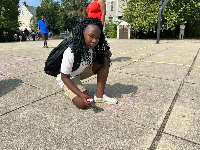 To combat neo-Nazi flyers posted in her neighborhood, Jenks fifth grader Tashyia Ishman wrote &ldquo;LOVE WINS&rdquo; on the grounds of the school&rsquo;s playground in sidewalk chalk.