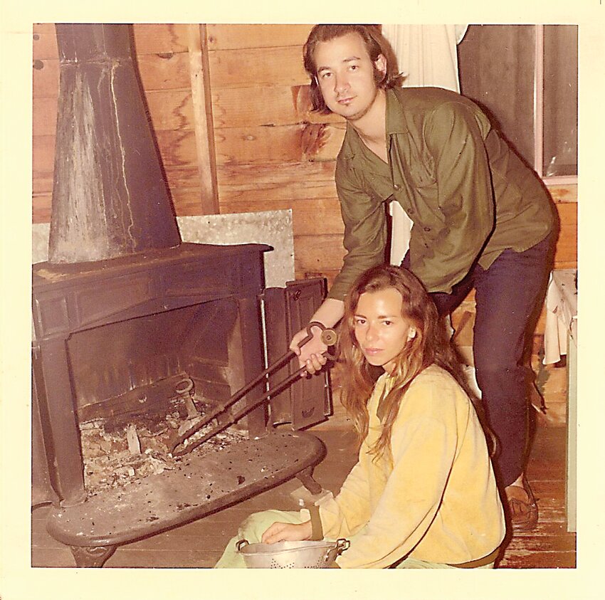 Len and Jeanette Lear in August of 1969 in a cabin in Maine after leaving Woodstock, trying unsuccessfully to start a fire in the fireplace.