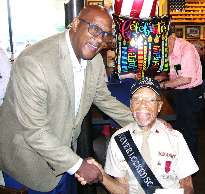 U.S. Congressman Dwight Evans (left), who represents Northwest Philadelphia, congratulates Benjamin Berry, of Germantown, on his 100th birthday, which was Sept. 21. Berry fought in the Battle of the Bulge, the deadliest battle for Americans during World War II. More than 19,000 G.I.s died in the fighting, and more than 70,000 were injured.