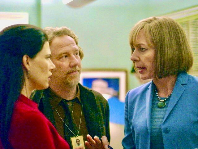 Fitzgerald, left, played White House aide Carol Fitzpatrick on &ldquo;The West Wing,&rdquo; and many of her scenes looked like this, reacting to some sharp repartee from Allison Janney, right, as press secretary C.J. Clegg, while actor Timothy Busfield looks on.