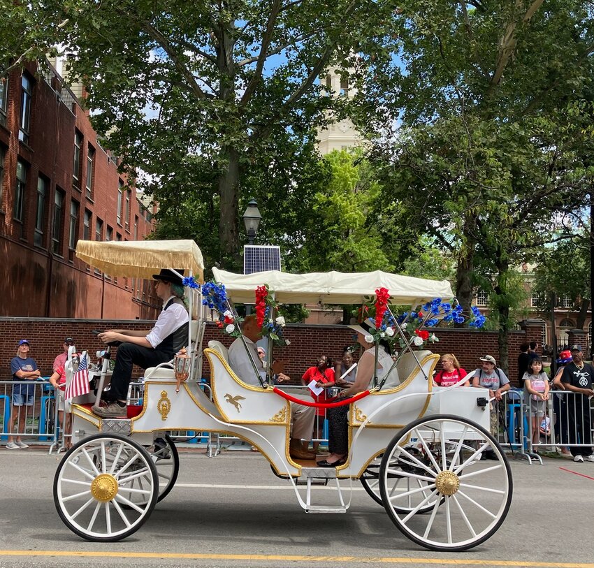 Caroline, an electric carriage that made its Philadelphia debut in the July 4th parade, is named in memory of Caroline Earle White, founder of Women&rsquo;s Animal Center. It is seen here with its champion, Janet White, who will bring it to the Fall for the Arts Festival.