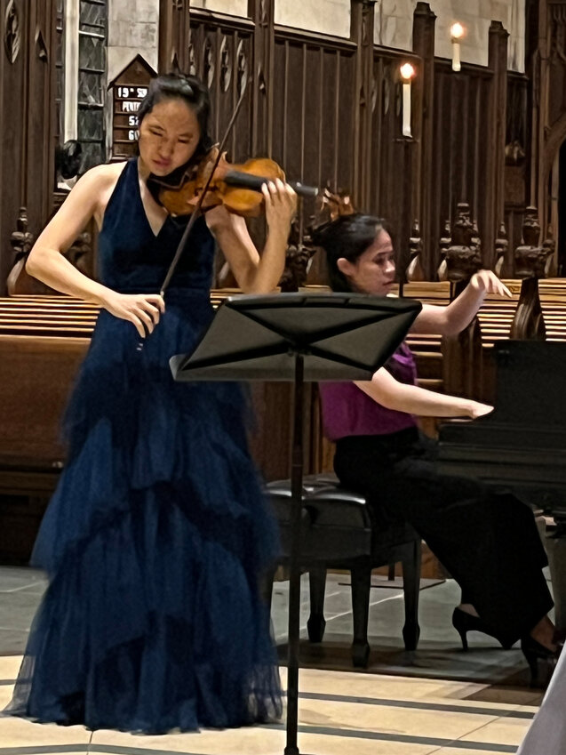 Violinist Danube Um performs with pianist Mika Sasaki during a recital at St.Paul&rsquo;s Episcopal Church in Chestnut Hill. The Oct. 6 concert was the opening of the church&rsquo;s &ldquo;Five Fridays&rdquo; series of fundraising recitals.