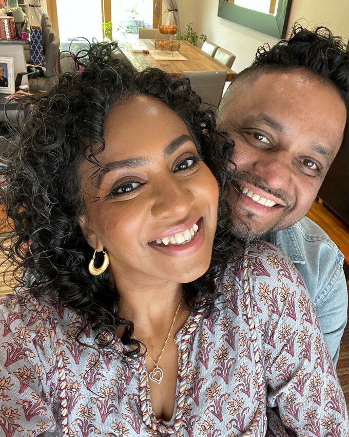 Juby George, seen here with his wife, Shireen, owns Smell the Curry Indian Food outlets in the Flourtown Farmers Market and the Market at the Fareway in Chestnut Hill.