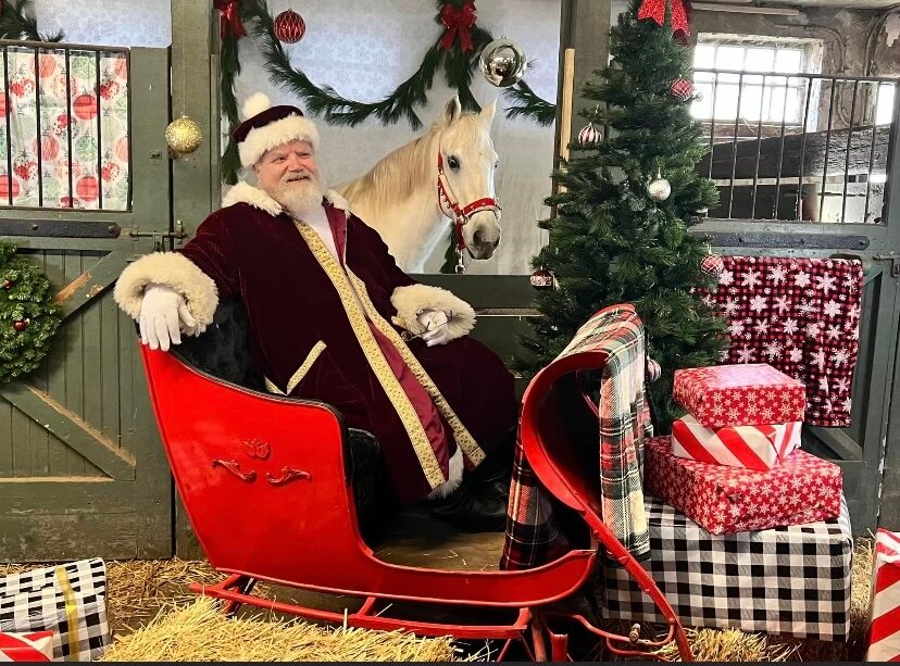 Santa will be sitting in his sleigh at Northwestern Stables on Saturday, ready and waiting for pictures with the kids.