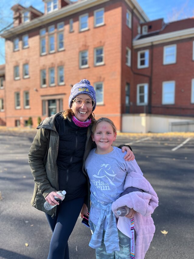 Runner Elise Fitzgerald poses with Shannon Craig, her aunt, 5K running buddy, and Norwood Fontbonne Academy Director of Curriculum and Innovation at a recent 5K run at the Philadelphia Navy Yard.