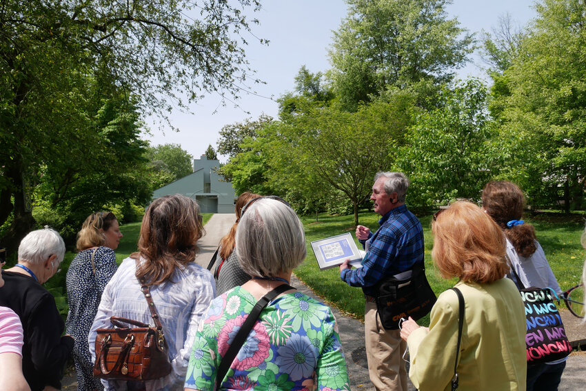 Conservancy Board Member Richard Bartholomew leads a walking tour through Chestnut Hill while stopping in front of the Vanna Venturi House at 8330 Millman Street.