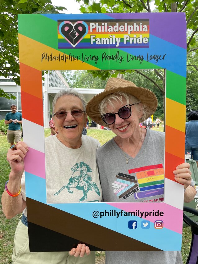 Mt. Airy residents Arleen Olshan (left) and Linda Slodki, two of the event's organizers, are seen at a &ldquo;Philadelphia Family Pride&rdquo; gathering in 2022.